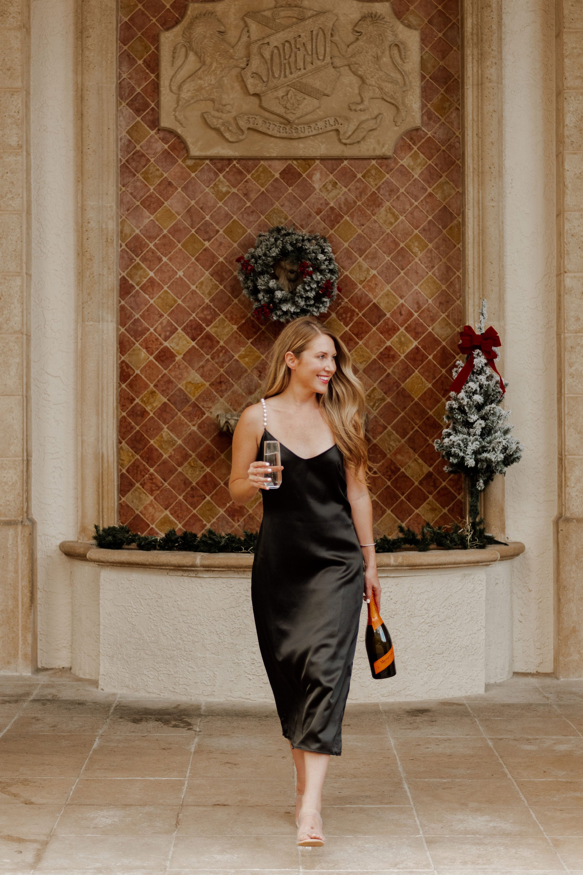 black dress with pearls